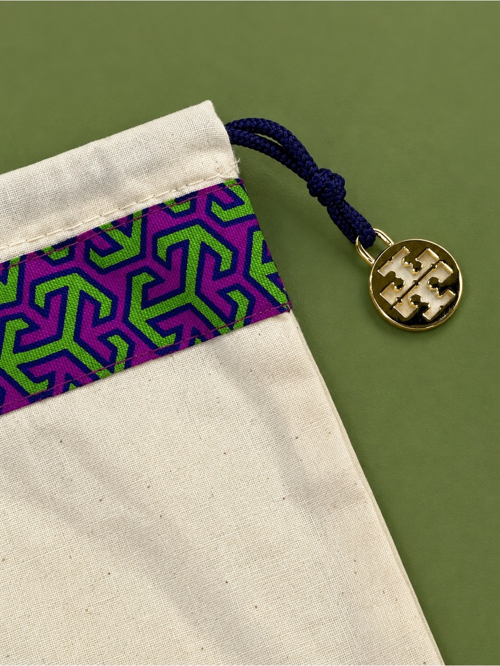 Tory Burch Cream Canvas Drawstring Pouch with Purple and Green Trim & Gold Logo